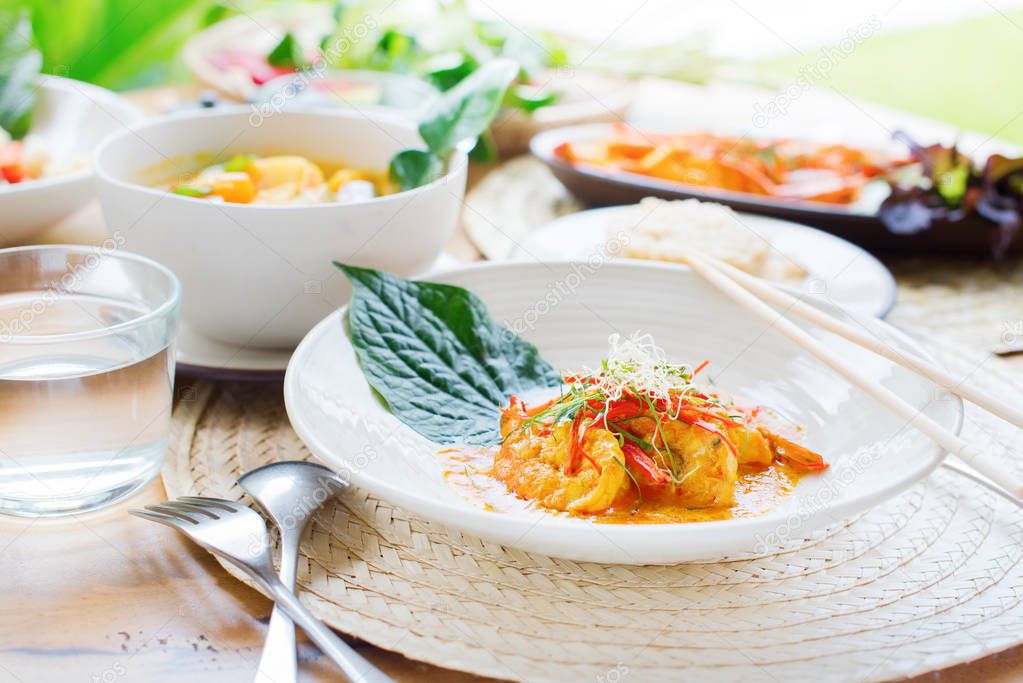 Shrimp in red curry paste with coconut milk kaffir lime leaves Thai traditional food