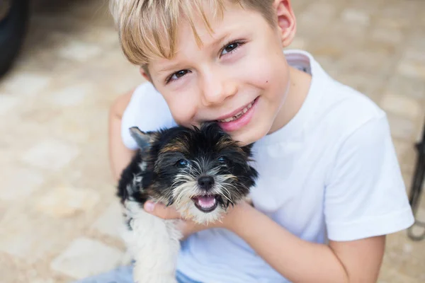 Happy Caucasian Boy Lovingly Embraces Puppy Purebred Biewer Yorkshire Terrier — Stock Photo, Image