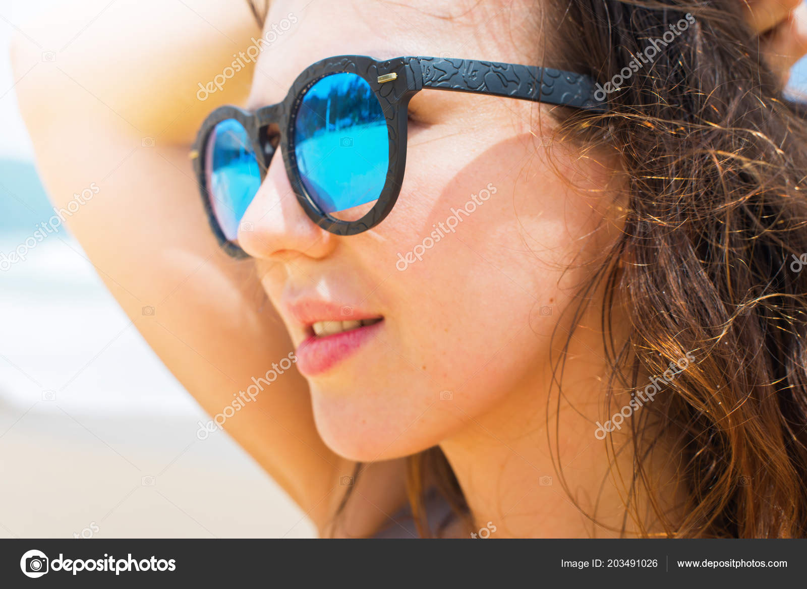 Close Portrait Relaxing Young Dark Wavy Hair Woman Blue Sunglasses