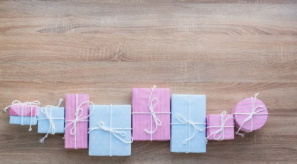 Birthday Gifts Festive Pastel Pink Blue Box Cord Blue Background — Stock Photo, Image