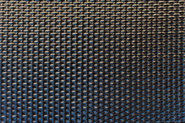 Close-up plástico preto wattled padrão de textura grade — Fotografia de Stock