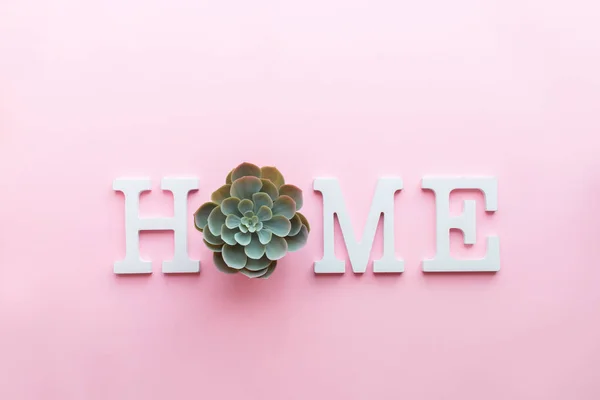 Word HOME white volume letters on pink background — Stock Photo, Image