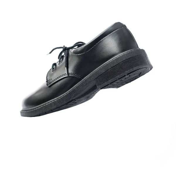 Новые черные кожаные туфли — стоковое фото