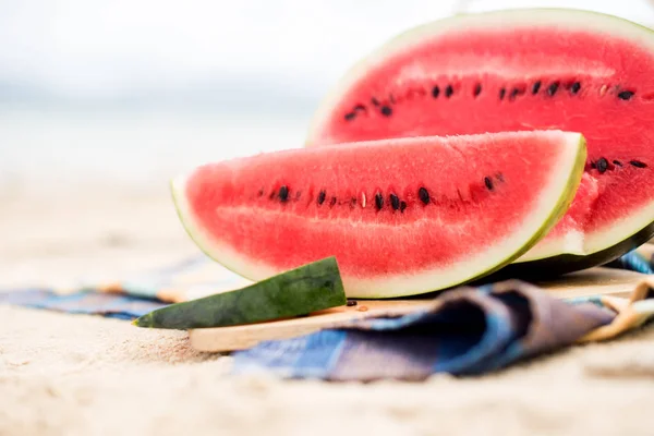 Summer picnic time on a beach. Fresh water melon — Stock Photo, Image