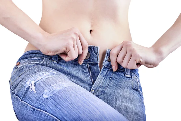 Overweight problem. Woman cannot button up her jeans — Stock Photo, Image