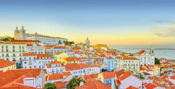 Old Lisbon town panoramic view at sunset. Portugal. — Stock Photo, Image