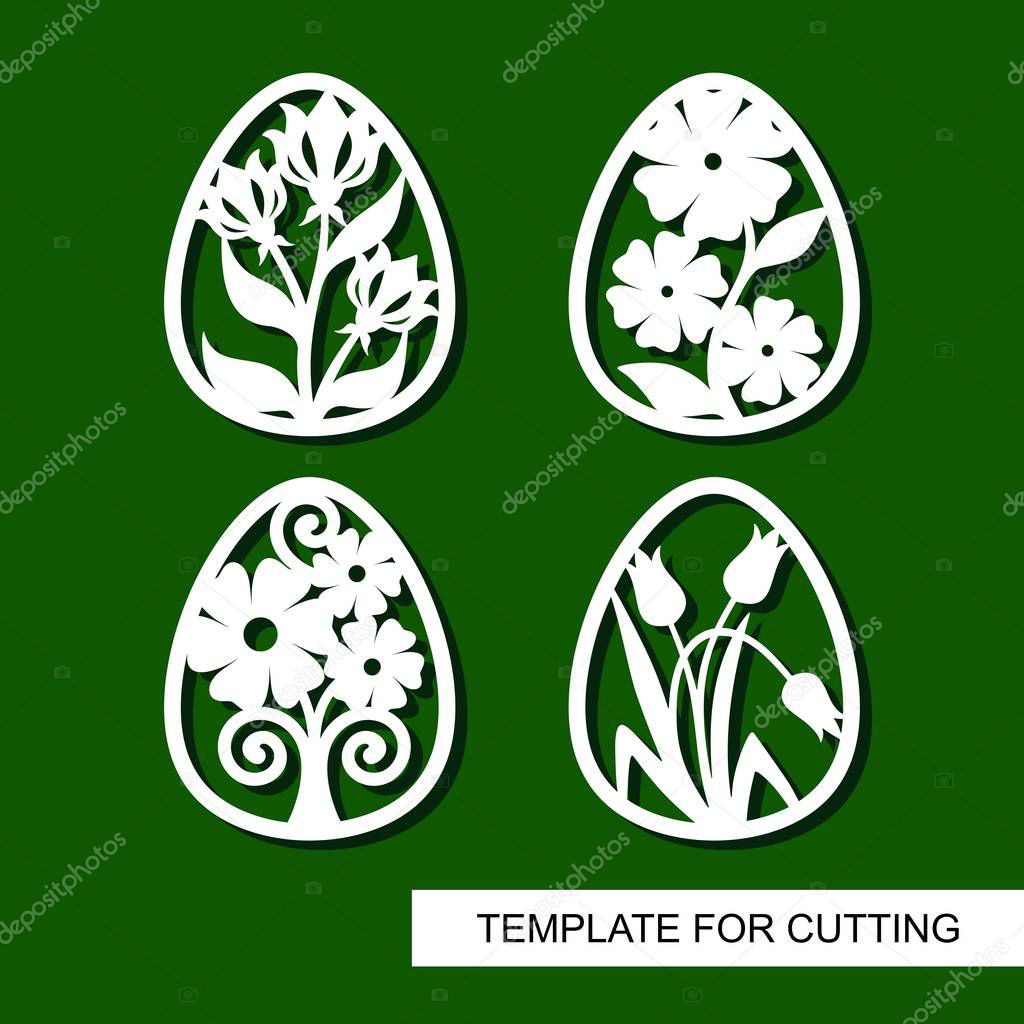 Set of decorative elements - Easter Eggs with floral ornament. White objects on green background. Template for laser cutting, wood carving, paper cut and printing. Vector illustration.