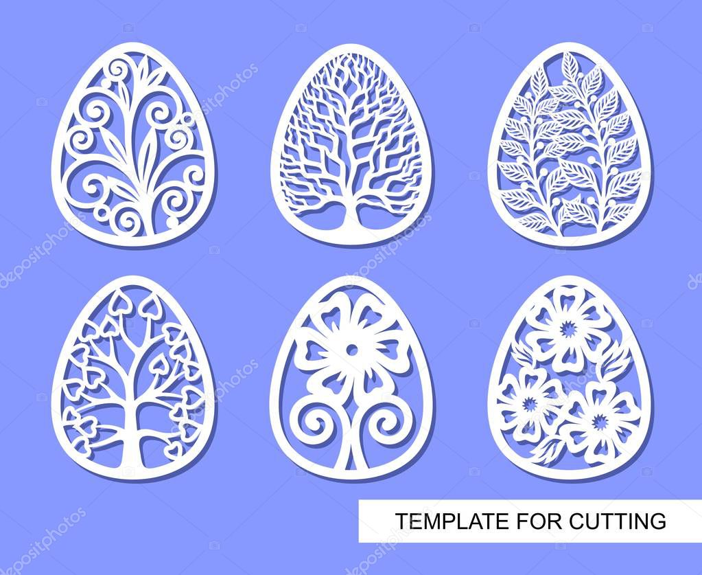 Set of decorative elements - Easter Eggs with floral ornament. White objects on blue background. Template for laser cutting, wood carving, paper cut and printing. Vector illustration.