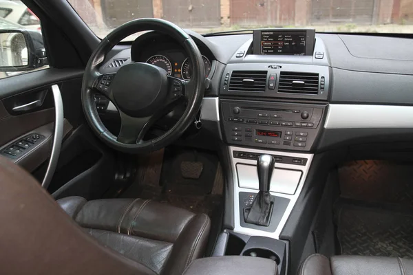 driver's seat and the car control panel, steering wheel and control devices