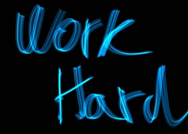 Azul neon estilo texto trabalho duro no fundo preto — Fotografia de Stock