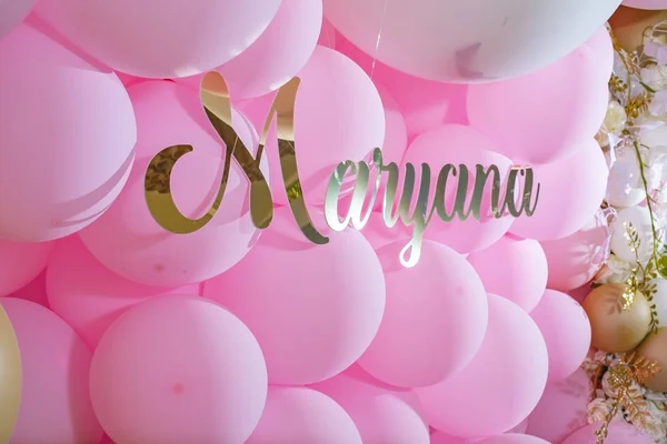 Decoration with pink and gold balloons
