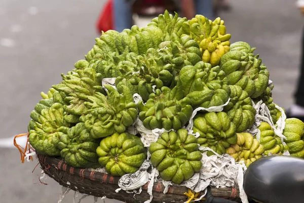 Many fingered citrons at market — Stock Photo, Image