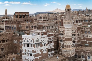 Multi-storey traditional buildings made of stone in Sanaa, Yemen clipart