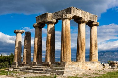 The remains of the Temple of Apollo in the archaeological site of Corinth in Peloponnese, Greece clipart