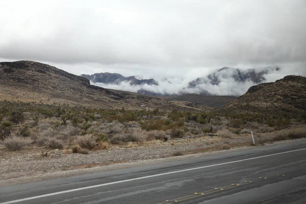The road red rock canyon in Foggy day at nevada, USA — стоковое фото