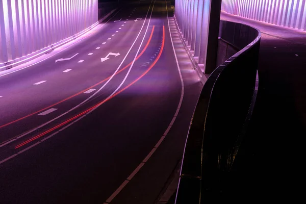 Abstract lines and LED colored architecture . Night scene with an urban city look in a tunnel