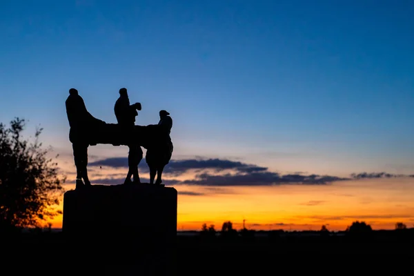 Evening silhouettes in the last sunlight of a warm Indian summers day in autumn