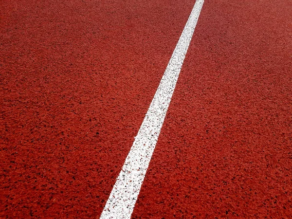 Carril Blanco Una Pista Atletismo Del Estadio Rojo Cerca Curva — Foto de Stock