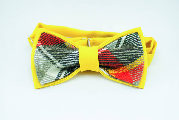 Well-designed stylish yellow bow tie made of soft cloth
