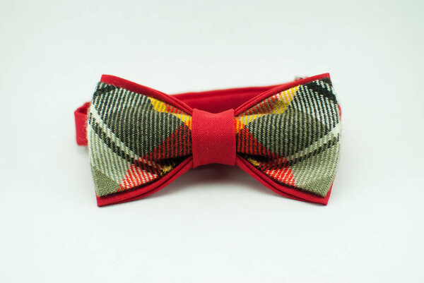 Well-designed stylish red bow tie made of soft cloth