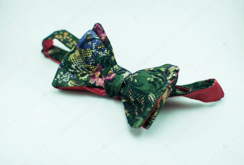 Stylish and well-designed colorful self tied bow tie on white background