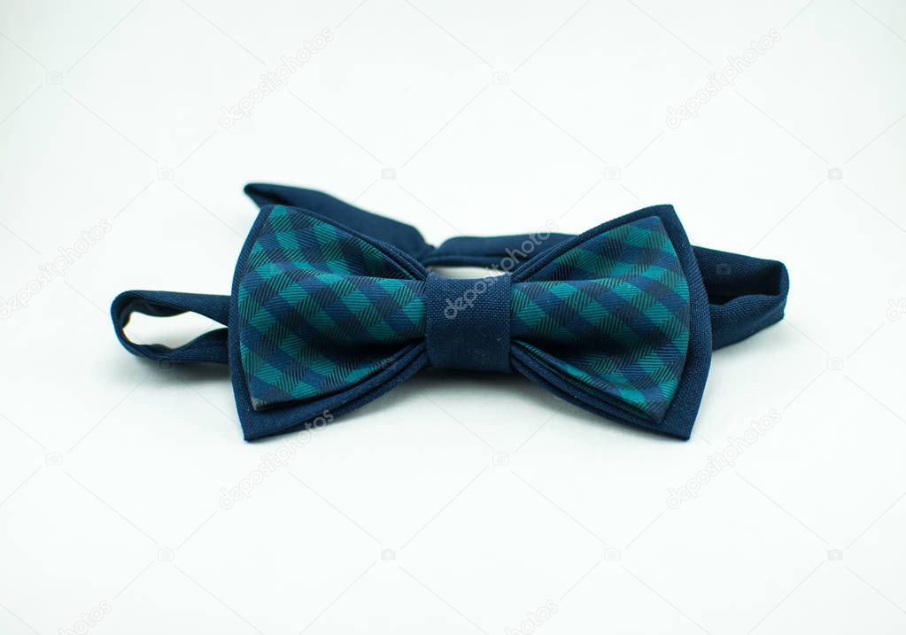 Stylish and well-designed blue bow tie on white background