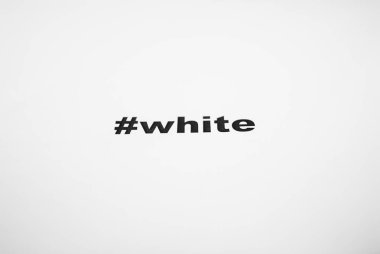 Closeup yazılı bir #white. Heshtag kelime kağıt sayfası