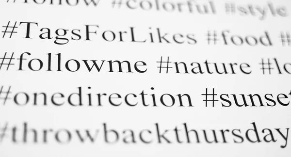 Closeup Typed Popular Hashtags Words Paper Sheet Abstract Concept Social — Stock Photo, Image