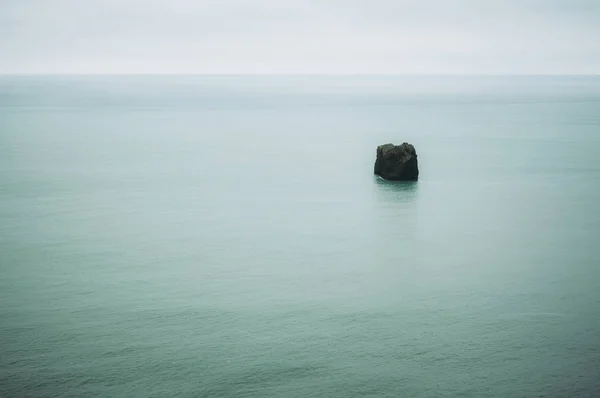 Calm water and rocky stone. Minimalist Iceland — Stock Photo, Image