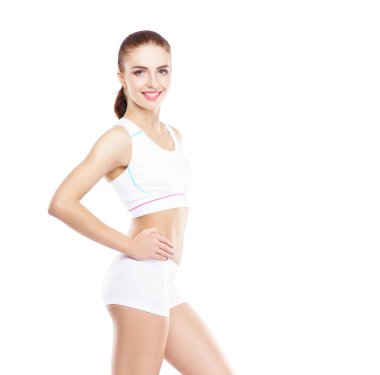 Genç, uygun ve sportif kadın beyaz arka plan üzerinde izole. Sağlık ve spor kavramı.