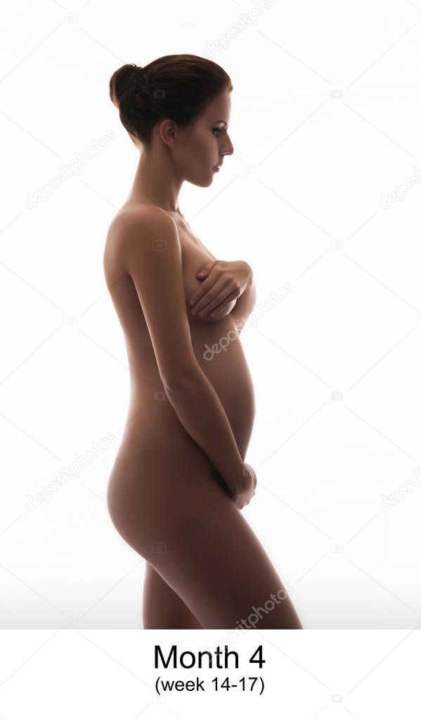 Beautiful pregnant woman expecting baby isolated on white. Month 4, week 14-17.