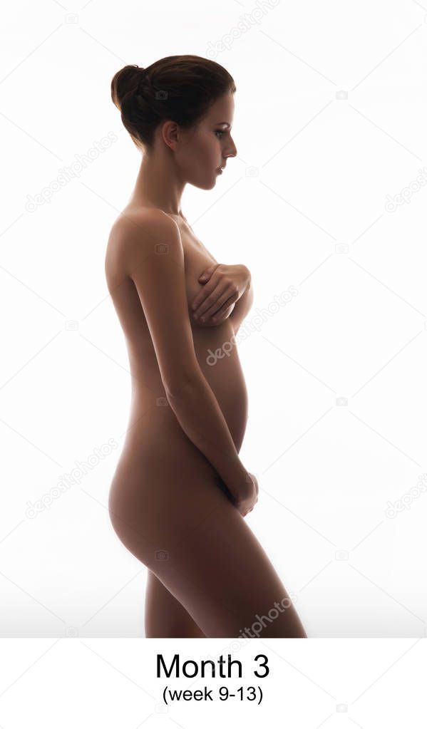 Beautiful pregnant woman expecting baby isolated on white. Month 3, wek 9-13.