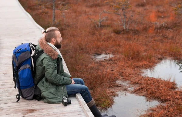 Bearded Guy Backpack Sitting Swamps Camp Adventure Traveling Fishing Concept — Stock Photo, Image