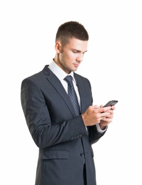 Resmi kıyafeti kendine güvenen bir adam. Takım üzerinde beyaz izole iş adamı. İş kavramı.