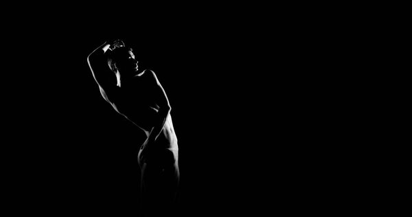 Black and white silhouette trace of male ballet dancer. Long monochrom horizontal image.