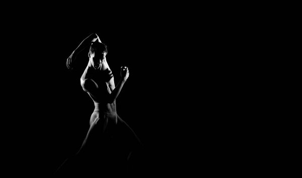 Black and white silhouette trace of male ballet dancer. Long monochrom horizontal image.