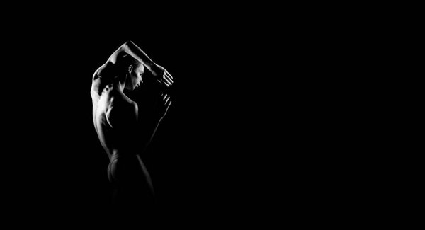 Black and white silhouette trace of male ballet dancer. Long monochrom horizontal image.