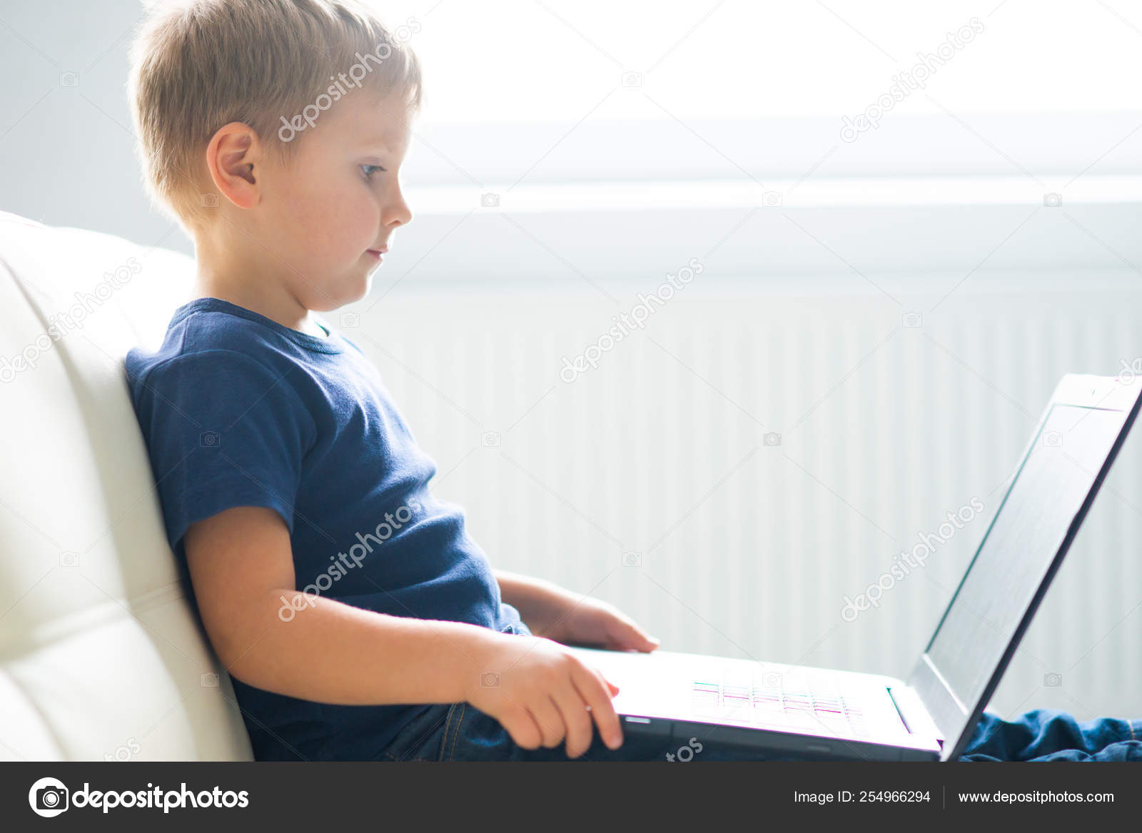 kid playing computer