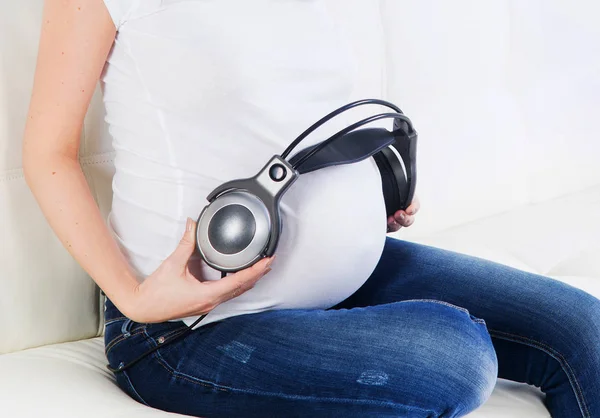 Close Expectant Mother Giving Her Baby Listen Music — Stock Photo, Image