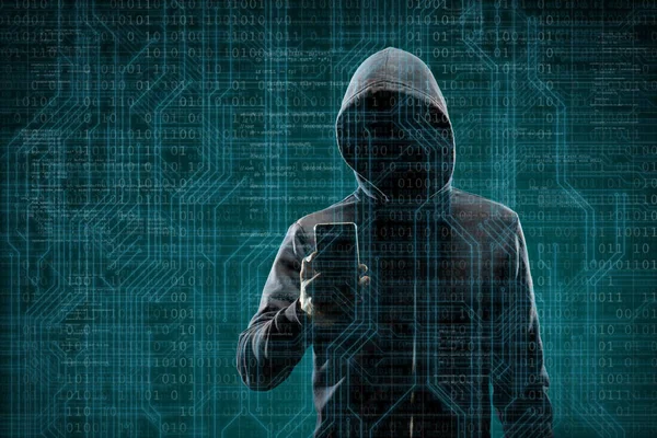 Computer hacker in mask and hoodie over abstract binary background. Obscured dark face. Data thief, internet fraud, darknet and cyber security concept.