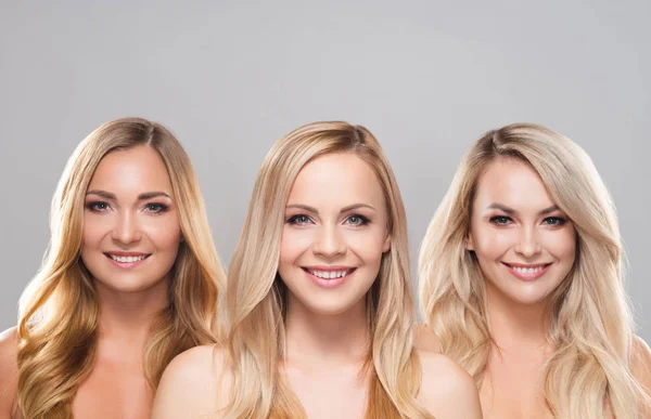 Studioporträt junger, schöner und natürlicher blonder Frauen vor grauem Hintergrund. Nahaufnahme lächelnder Mädchen. Facelifting, plastische Chirurgie, Kosmetik und Make-up. — Stockfoto