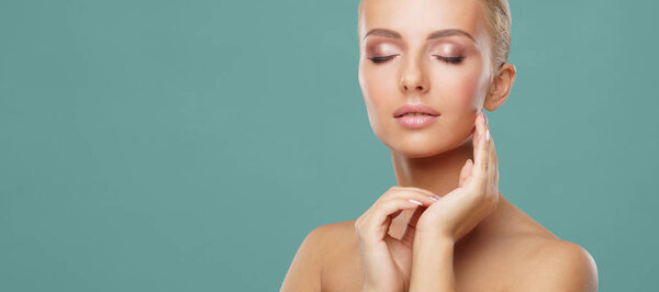 Beautiful face of young and healthy woman. Skin care, cosmetics, makeup, complexion and face lifting.