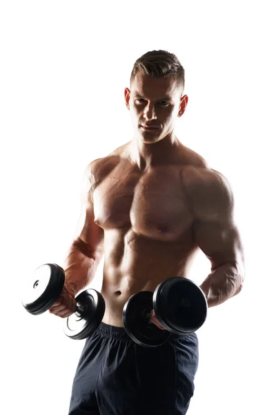 Strong, fit and sporty bodybuilder man over white background. Sport and fitness. — Stock Photo, Image