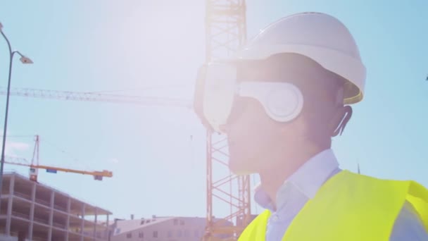 Professional Builder Helmet Standing Front Construction Site Using Virtual Augmented — Stock Video