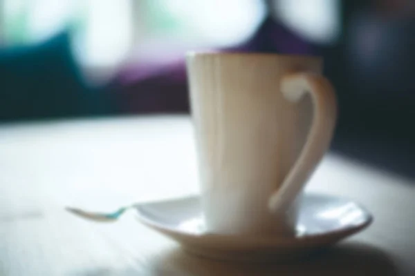 Imagen borrosa de la taza de café blanco —  Fotos de Stock