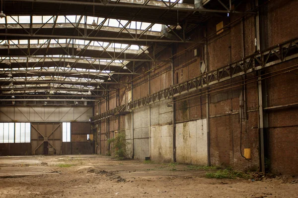 Abandoned empty old factory workshop interior