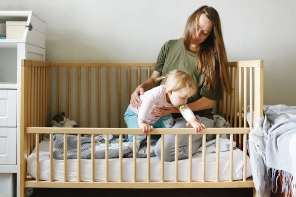 Young Beautiful Mother Holding Her Toddler Baby Girl Sitting Together — Stock Photo, Image