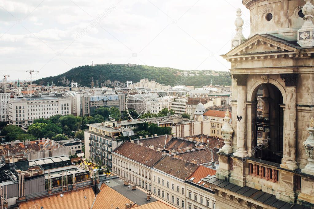 View from Basilica of Saint Stephen on cityscape with Ferris wheel of Budapest, Hungary