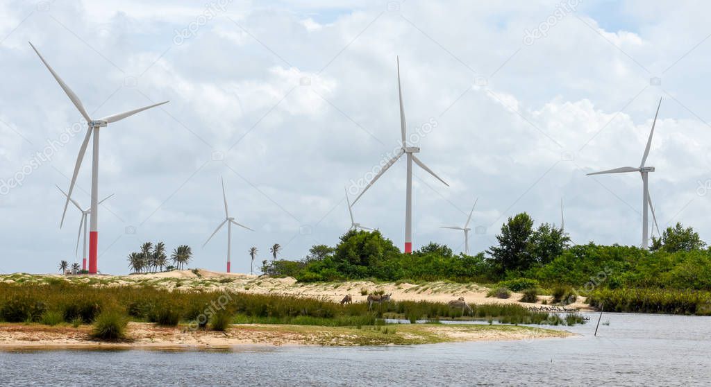 Windmills on the sand dunes of Lencois Maranhenses near Atins on Brazil