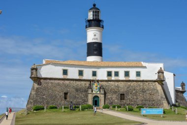 The historic Farol da Barra (Barra Lighthouse) in Salvador Bahia clipart